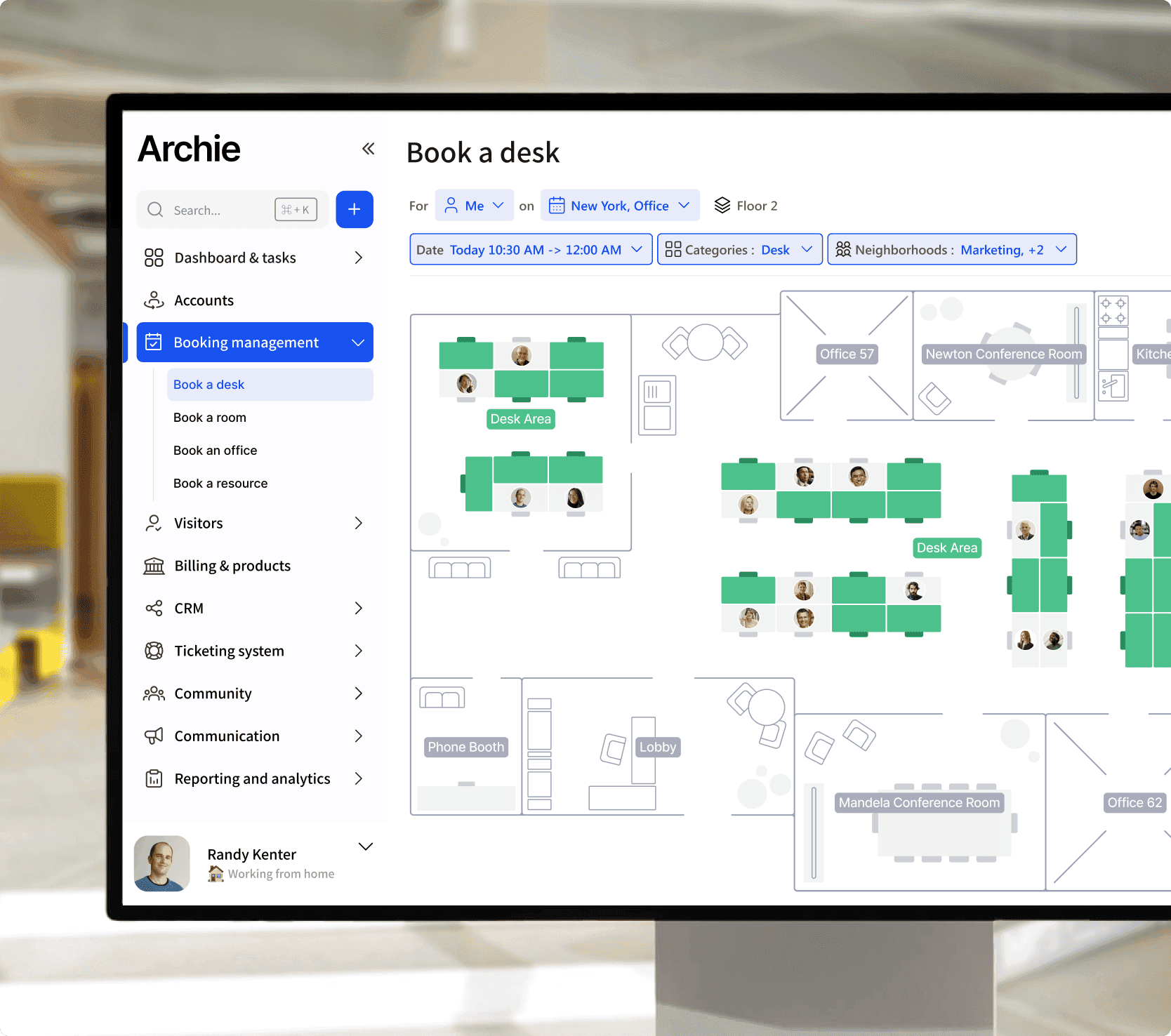 A screenshot of a desktop Archie app interface for workspace management, showing options to book a desk, view floor plans, and manage bookings. The interface includes a navigation menu with various management options such as dashboard and tasks, accounts, visitors, billing, CRM, and more.