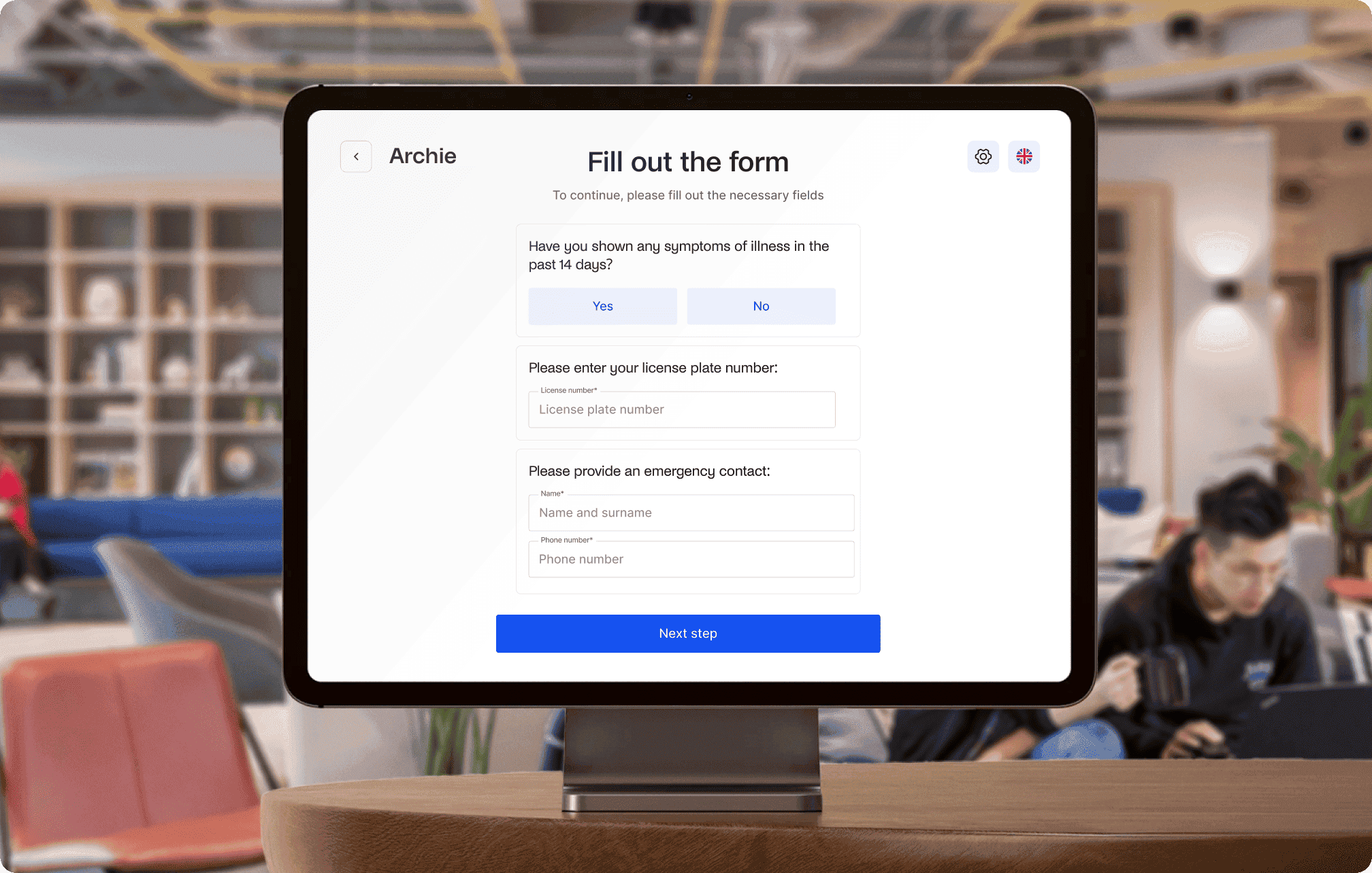 Tablet screen with Archie Visitors app displaying a form for health and contact information.